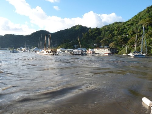 Tsunami The dock underwater in the middle of the surge © Wayne Hodgins